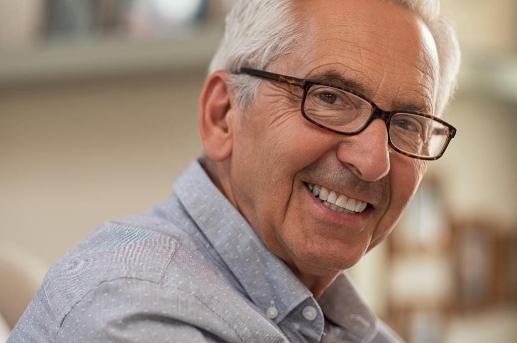 best dentist in Melrose MA | Happy elderly man.