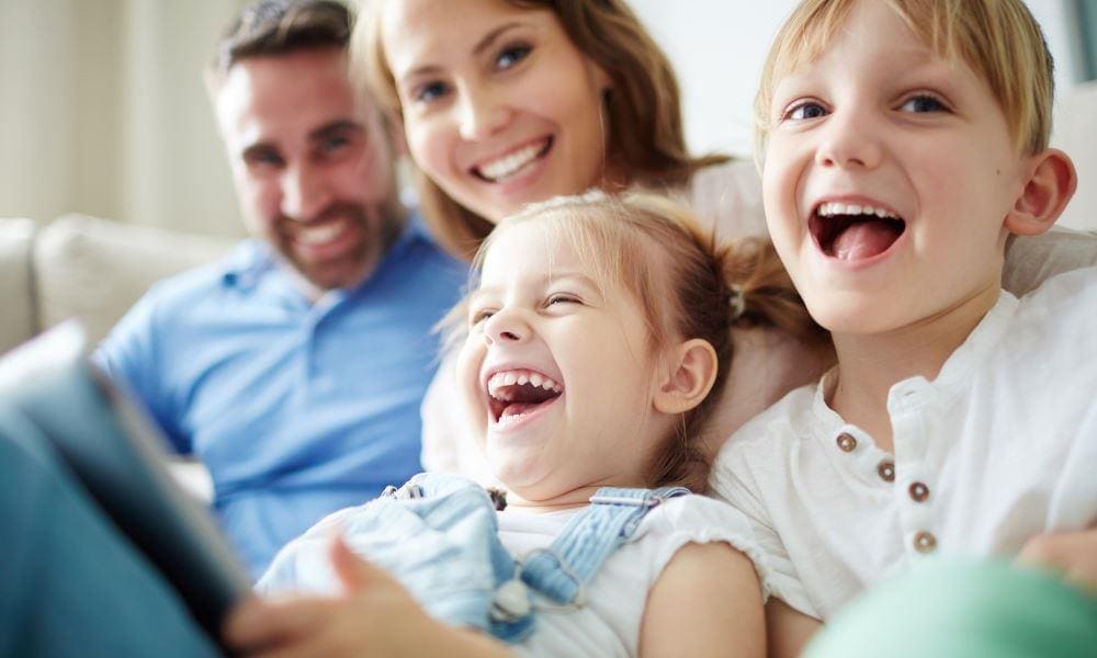 Melrose Dental Group | Happy family smiling.