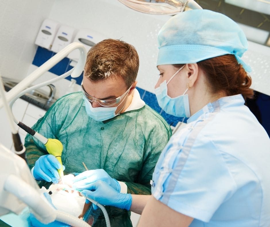 emergency dentist near me | dentist and assistant working