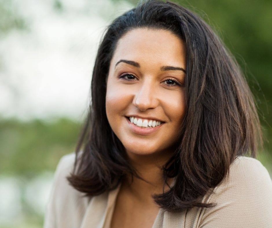 woman smiling | dental implant