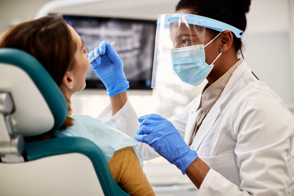 A variety of dental care procedures being performed in a modern dental clinic, emphasizing the importance of oral health.