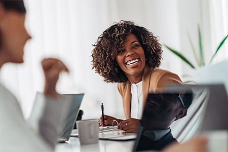 Female professional smiling at work.